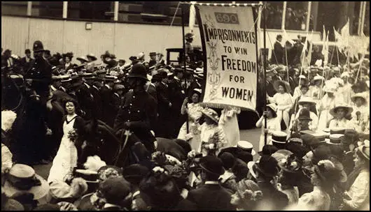 Start of the 700 women wearing white to represent those who had served terms of imprisonment.